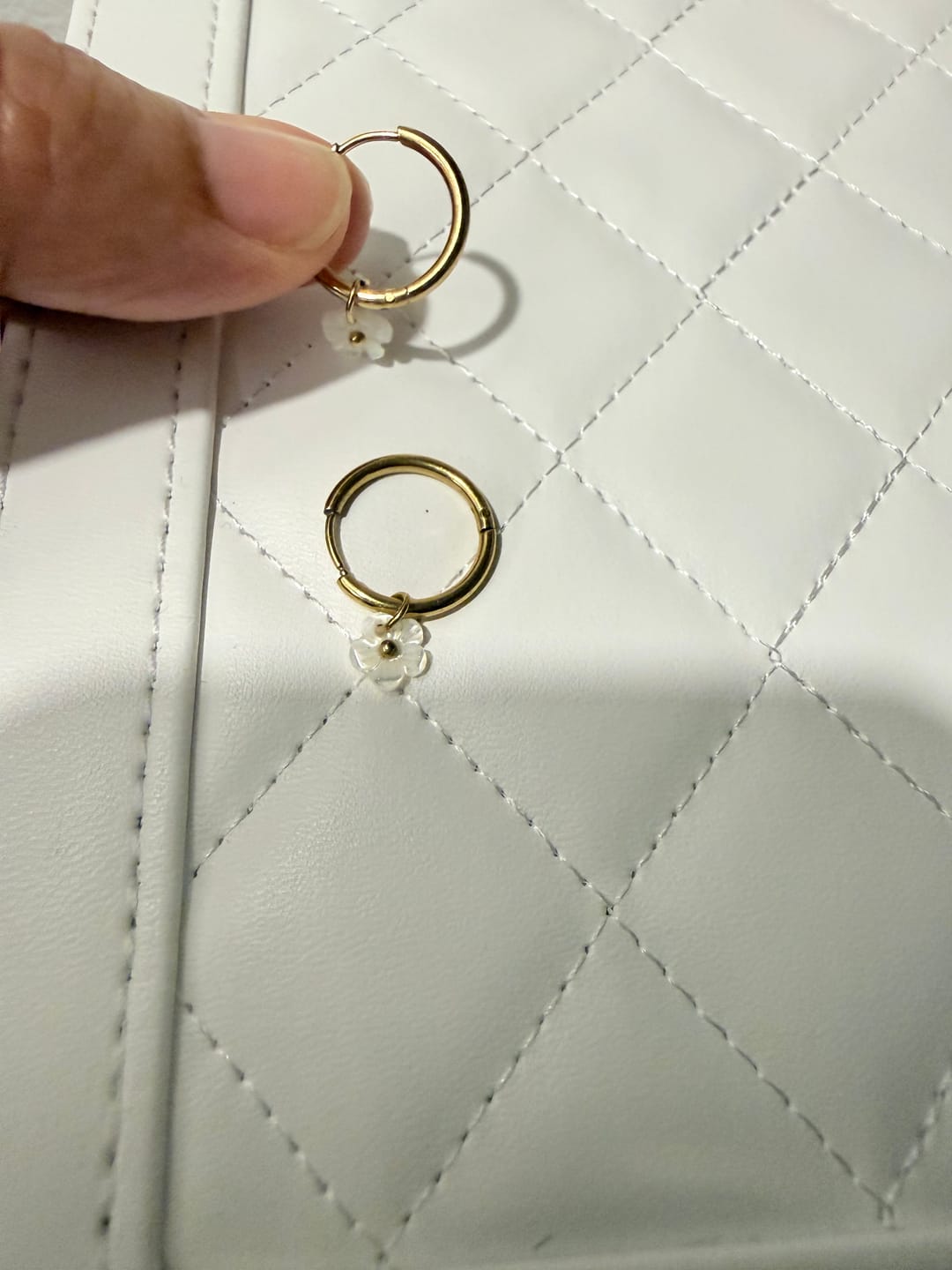 Customer photo review of White Petal Shell Hoop Earrings