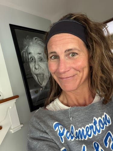Customer showing her facial results after using the Seranova Micro Infusion System.