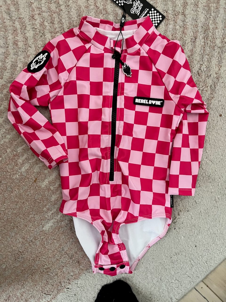 Customer photo review of UPF50+ Girls One Piece Swimsuit in Bubble Gum Checkered