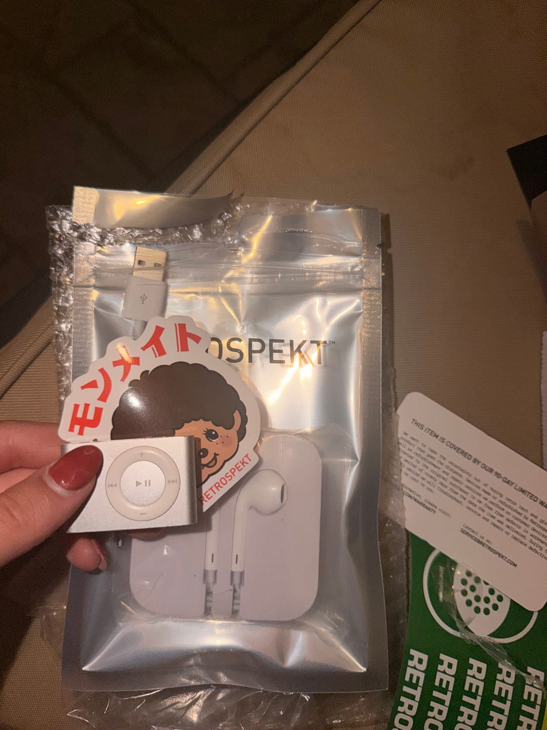 Customer photo review of Apple iPod Shuffle (2nd Generation) 1GB MP3 Player