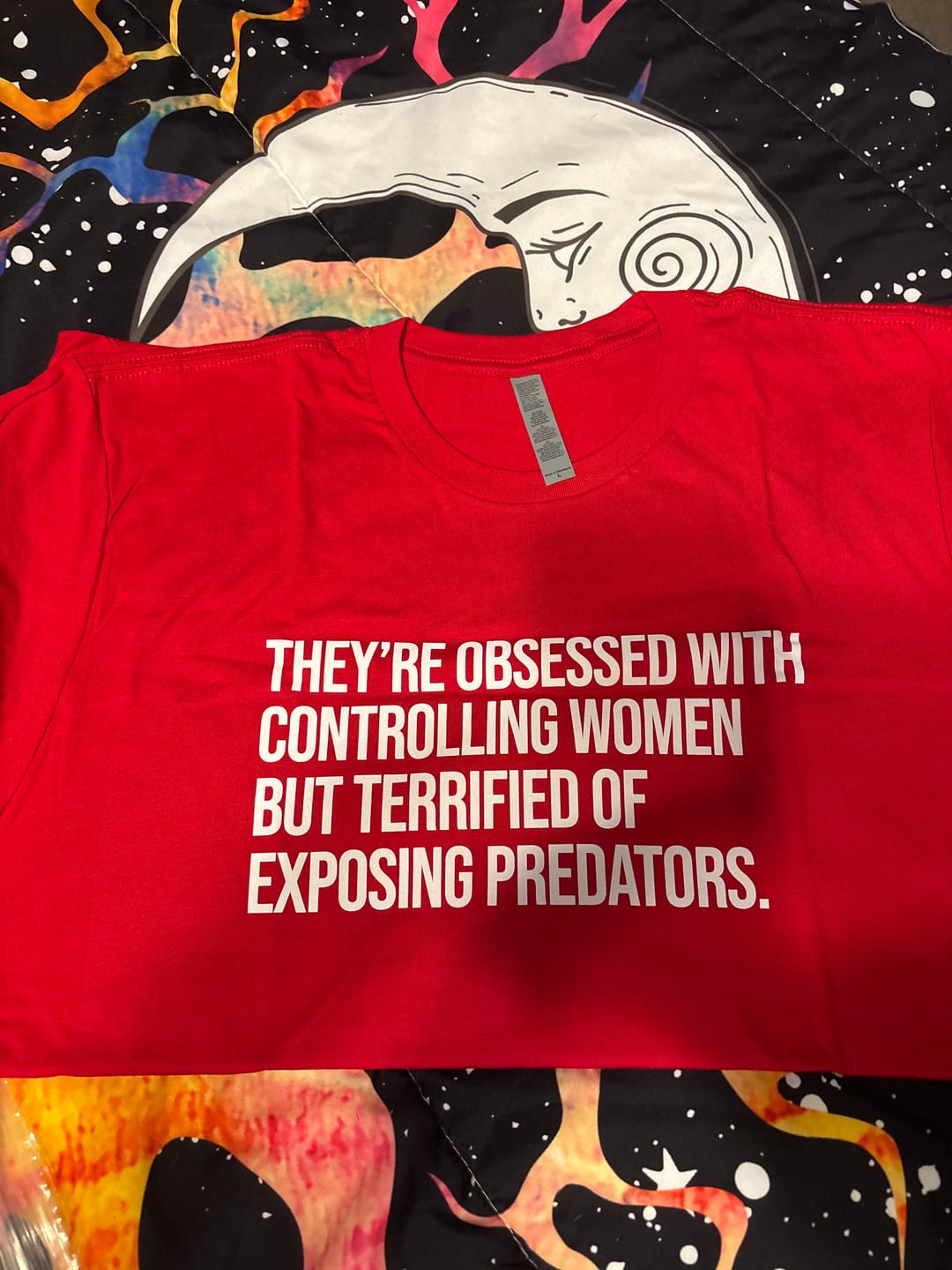 Customer photo review of They’re Obsessed with Controlling Women but Terrified of Exposing Predators Unisex Tee