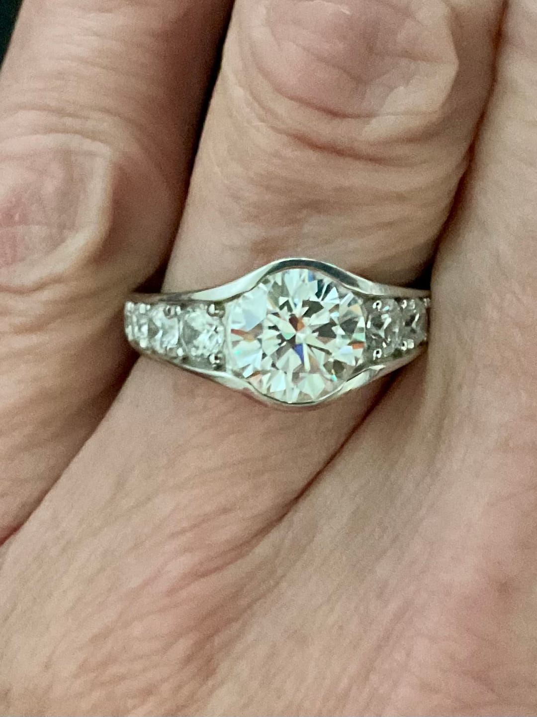 Customer photo review of Bezel Round Moissanite Channel Euro Shank Engagement Ring