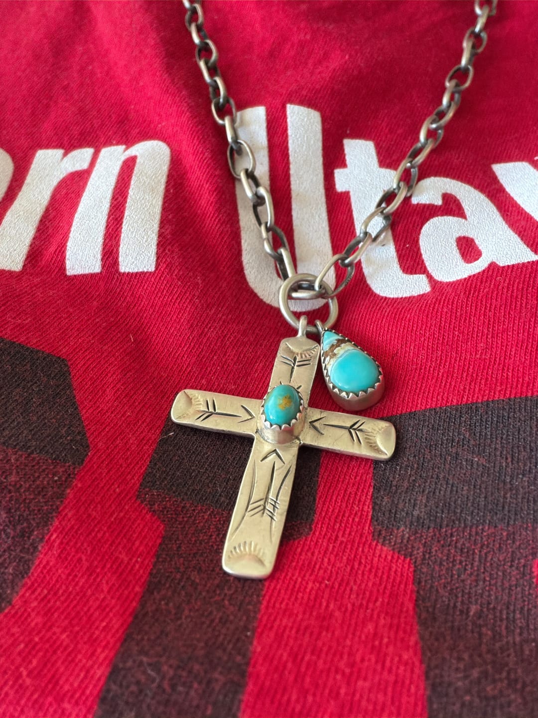 Customer photo review of Handmade Golden Hills Turquoise Tear Drop & Etched Sterling Silver Cross Pendant