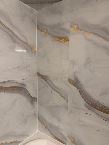 Customer photo review of Panneau Mural PVC Effet Marbre Doré – Étanche et facile à poser