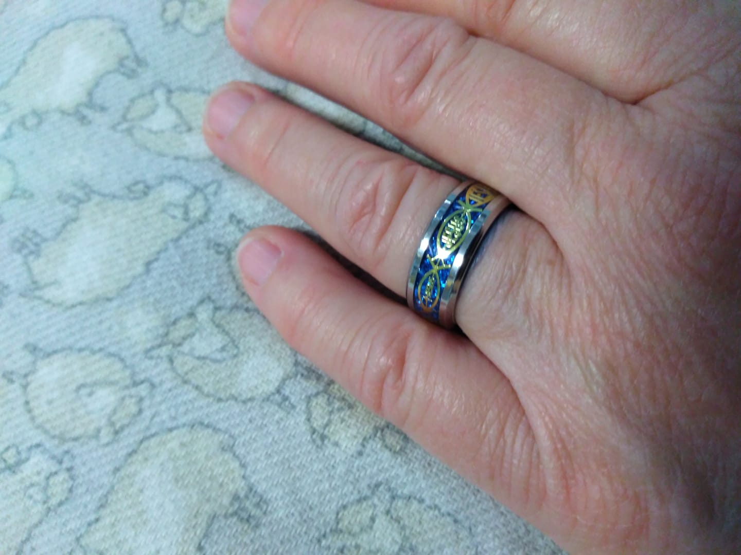 Customer photo review of Christianartworkshop Rustic Stainless Steel Ring: "Jesus" in Fish