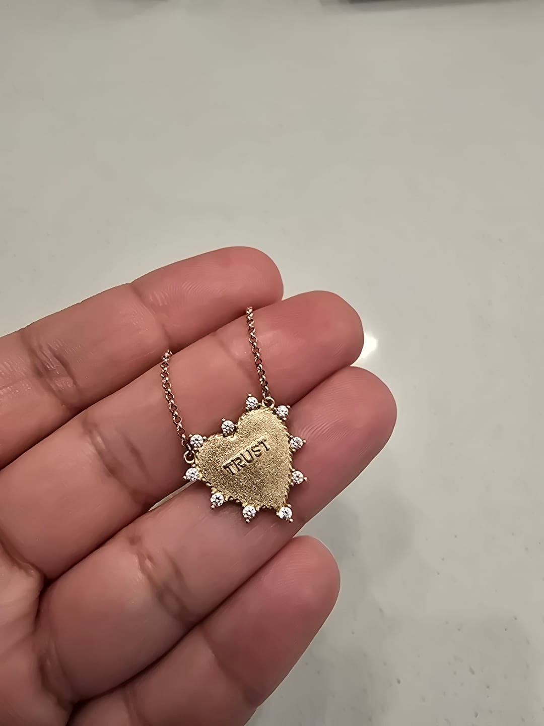 Customer photo review of Gold Heart of Trust Necklace