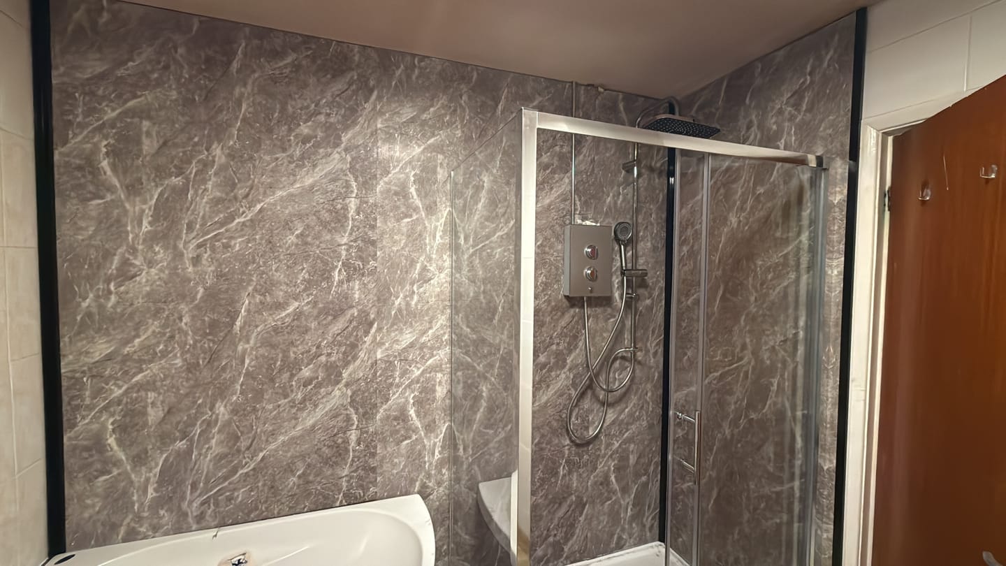 Customer photo review of 10mm Dark Grey Marble Matt Shower Panel 1M x 2.4M