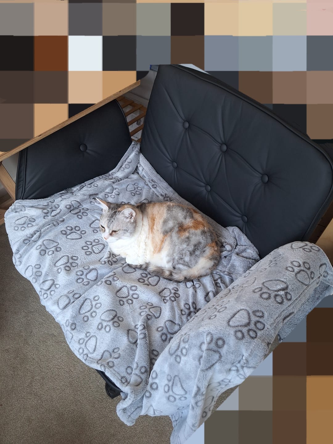 Customer photo review of Cross-Legged Swivel Office Chair with Armrests  – Faux Leather Black