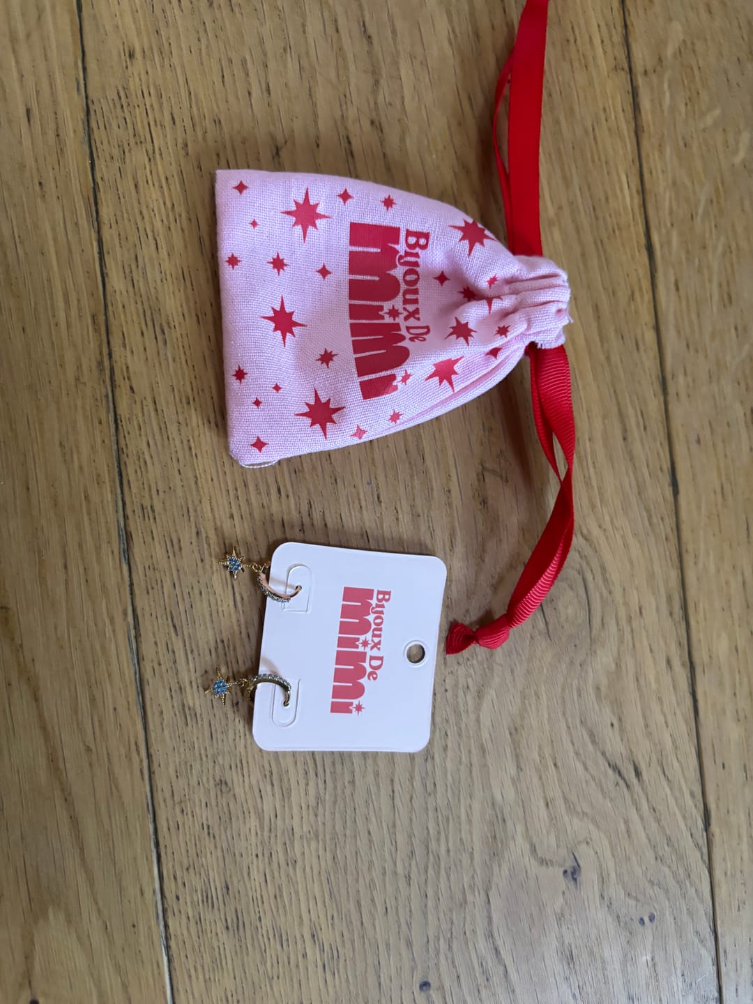 Customer photo review of Cosima Blue Gold Star Huggie Earrings