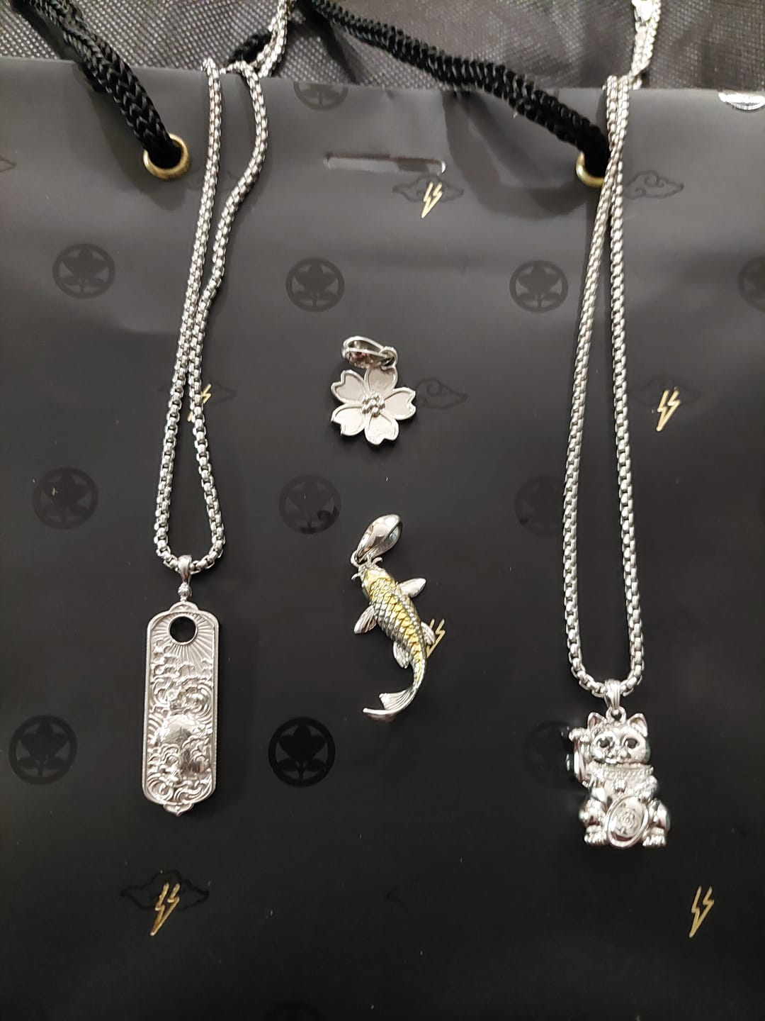 Customer photo review of Silver Maneki-neko / Lucky Cat Necklace