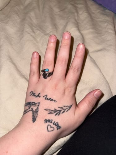 Customer photo review of GRACE CROSS FLORAL RING - (ADJUSTABLE)
