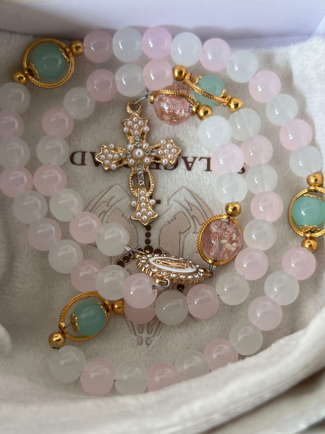 Customer photo review of SolaceBeads Artistic Pink & White Beaded Rosary: A Fusion of Colors & Sacred Symbols