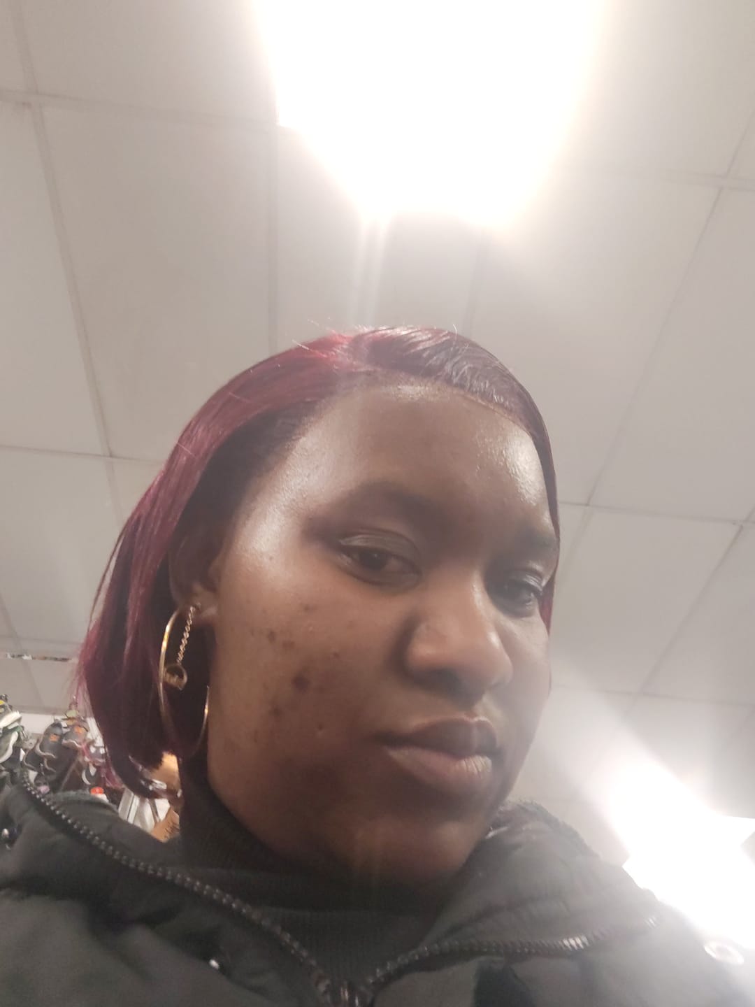 Customer photo review of Gold Luxe Logo Hoops