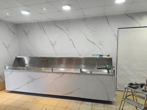 Customer photo review of Panneau Mural SPC Marbre Blanc Apollo Mat | Anti-Rayure & Étanche
