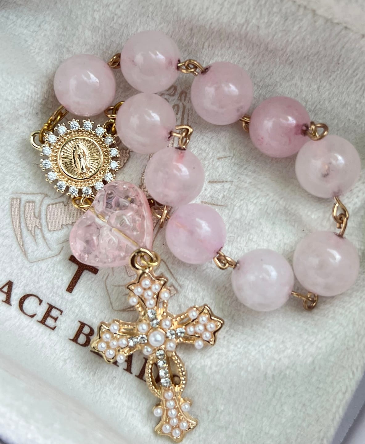 Customer photo review of SolaceBeads Artisan Rose Quartz Pocket Rosary: Soft Pink Beads with Sacred Cross & Marian Accents