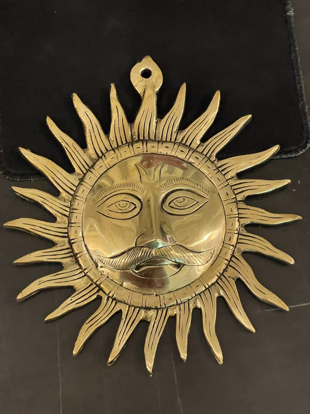 Customer photo review of Brass Surya (Sun) Ji Wall Hanging Idol Vastu Remedy for East Direction Balance, Fame and Positive Energy | 24 X 24 cm | 1 kg