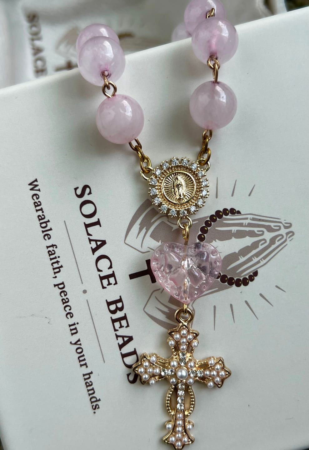 Customer photo review of SolaceBeads Artisan Rose Quartz Pocket Rosary: Soft Pink Beads with Sacred Cross & Marian Accents