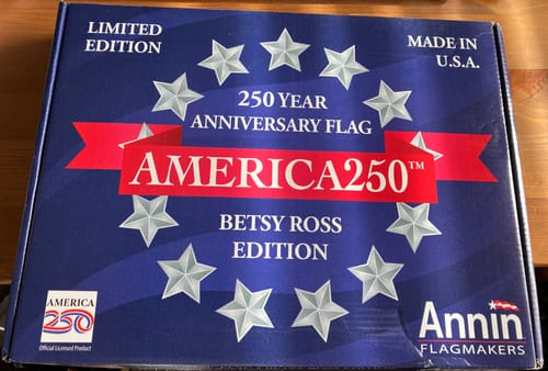 Reviewer's photo of the blue packaging for the America 250™ Betsy Ross Edition flag.