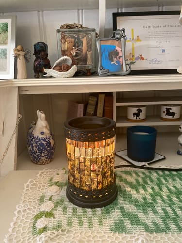 Customer's lit mosaic wax warmer on a desk, used to enjoy the Balsam & Cedar Wax Melts.