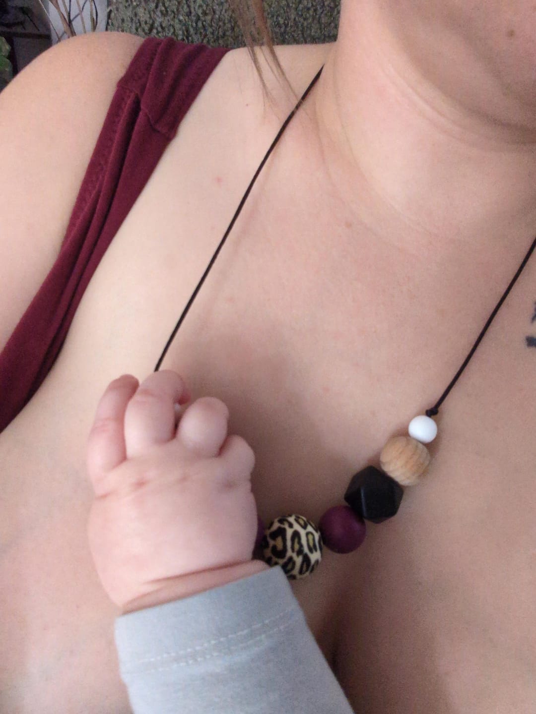 Customer photo review of Baby Feeding Necklace: Dark Animal