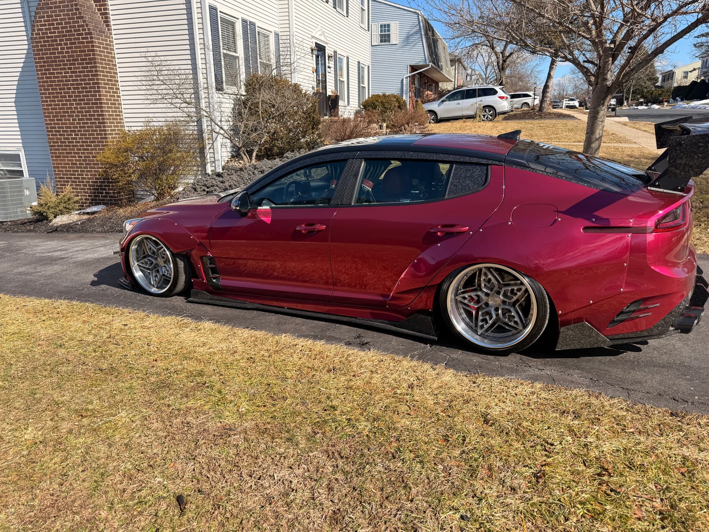 Customer photo review of Glossy Metallic Rubellite Purple Vinyl Wrap