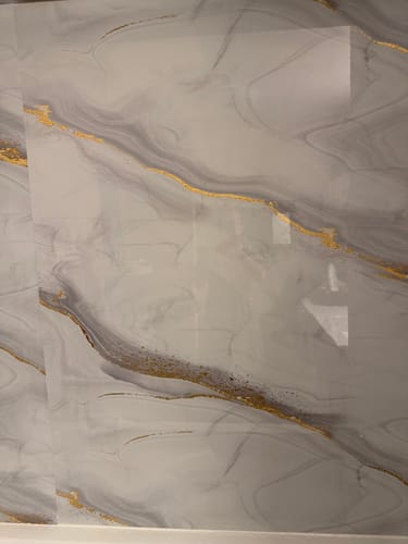 Customer photo review of Panneau Mural PVC Effet Marbre Doré – Étanche et facile à poser