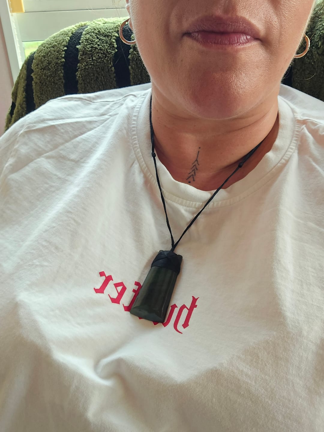 Customer photo review of Genuine NZ Kawakawa Greenstone Maori Toki Necklace