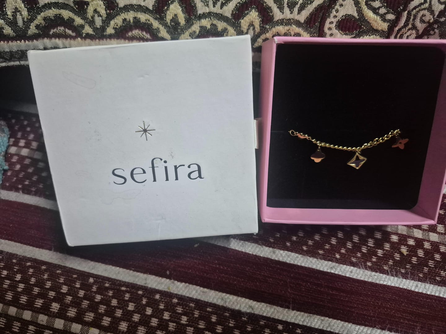 Customer photo review of Layered Charm Bracelet
