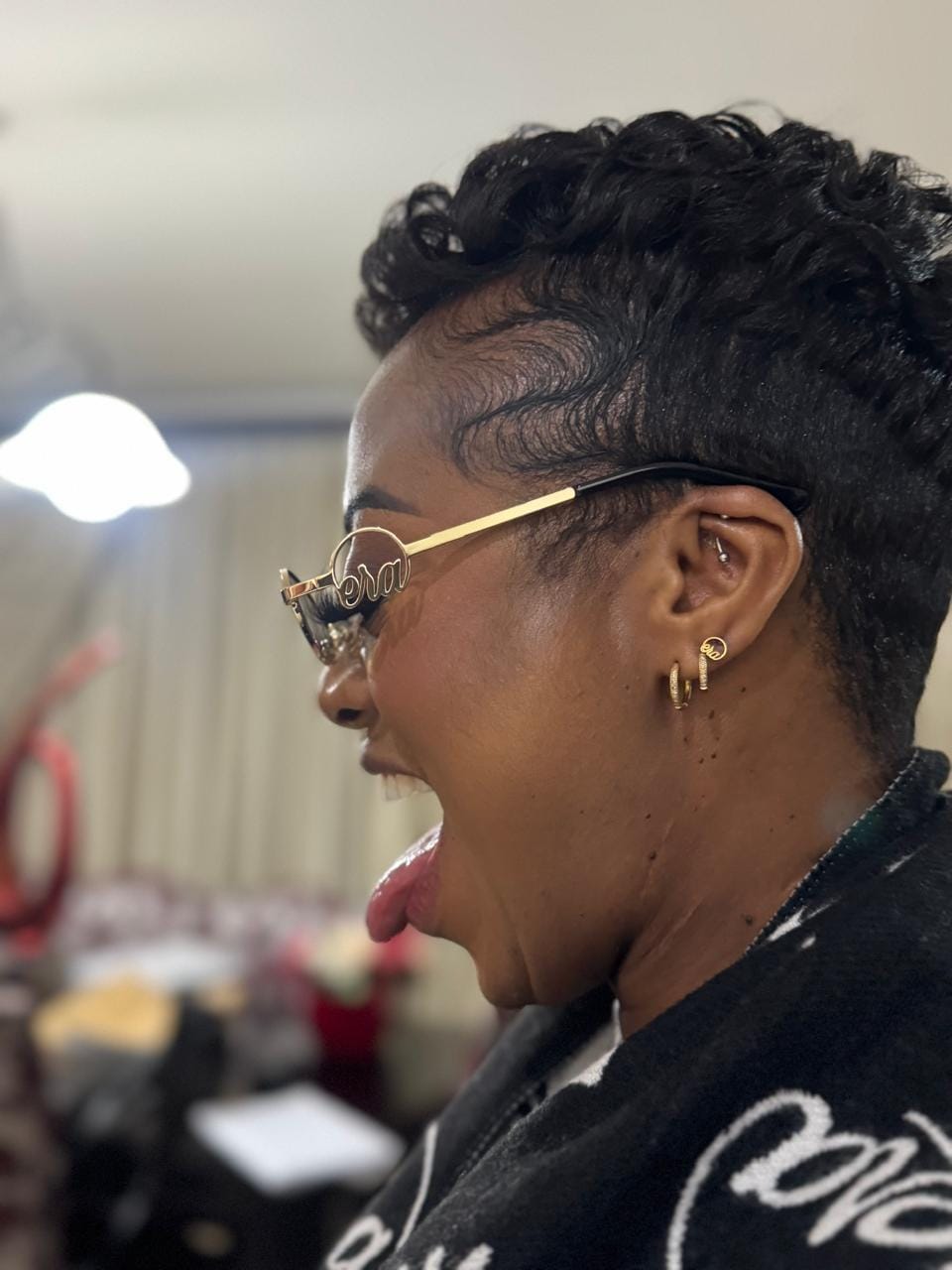 Customer photo review of Muse Logo Sunglasses – Gold Edition