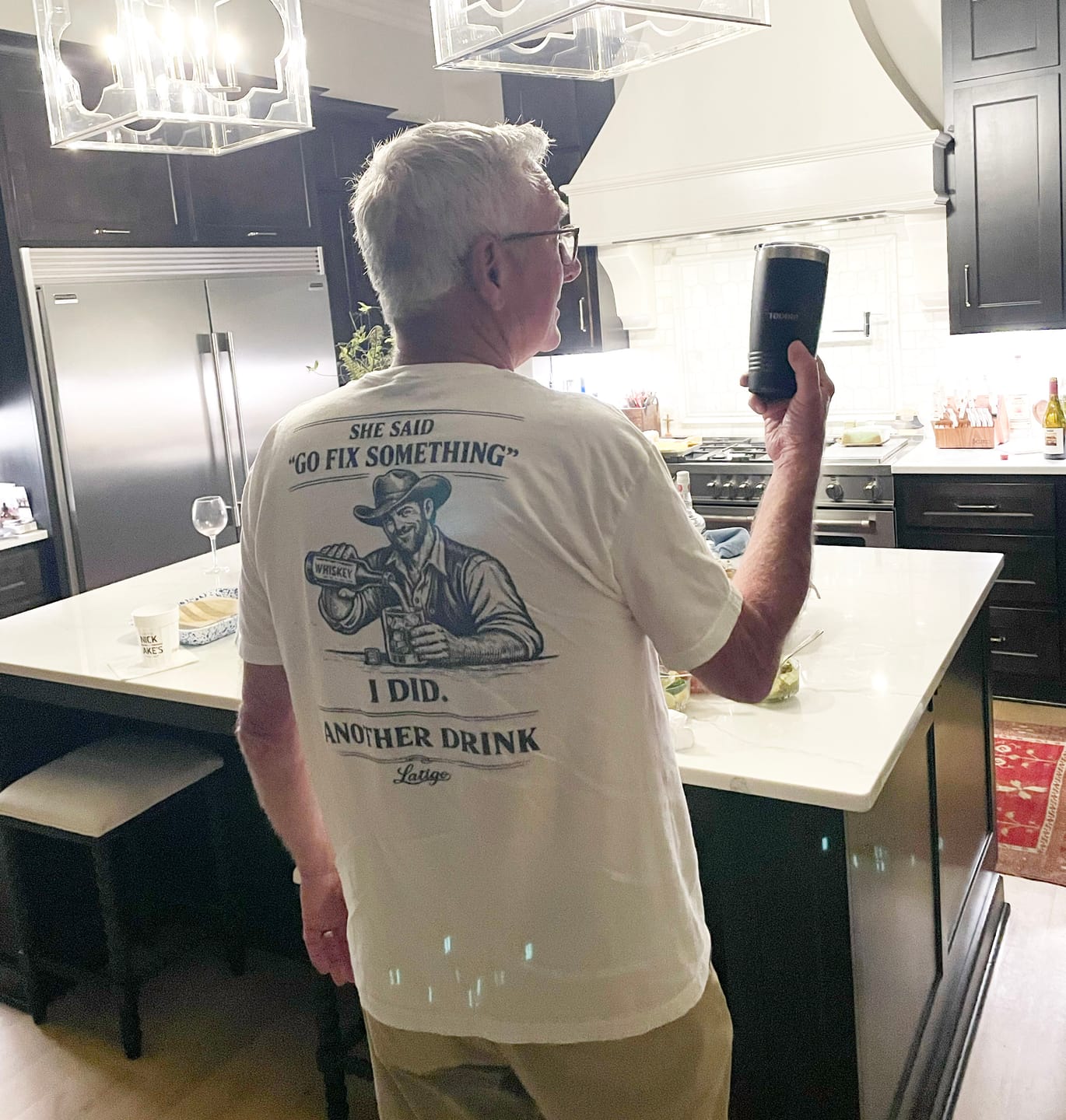 Customer photo review of Fix Something Tee