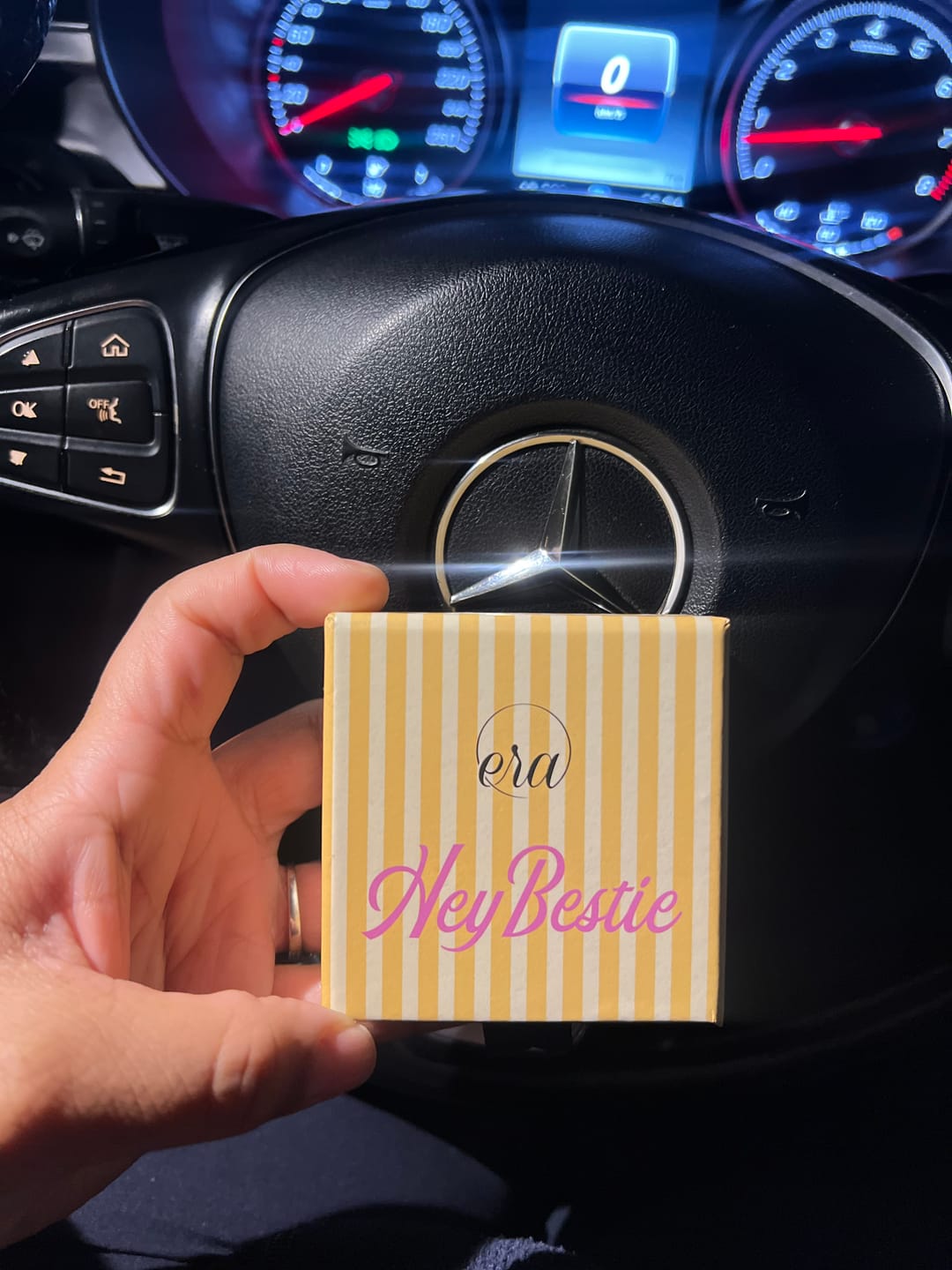 Customer photo review of Gold Luxe Mini Logo Hoops