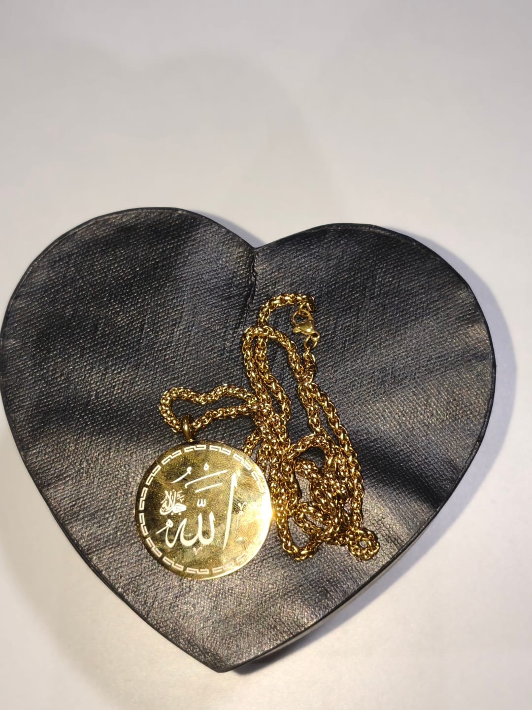 Customer photo review of HilalHaven Circle of Allah’s Majesty Engraved Pendant Necklace — Polished Stainless Steel