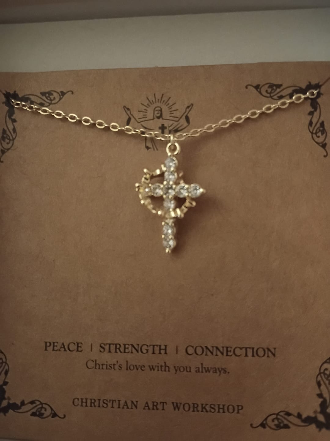 Customer photo review of FREE Today: Modern Crowned in Faith Cross Necklace, Earrings