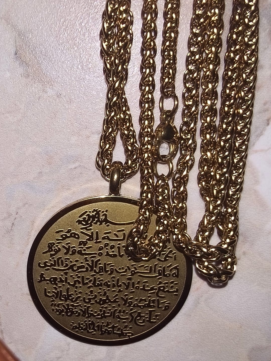 Customer photo review of HilalHaven Circle of Allah’s Majesty Engraved Pendant Necklace — Polished Stainless Steel