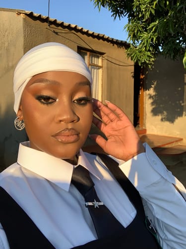 Customer photo review of Silver Luxe Mini Logo Hoops