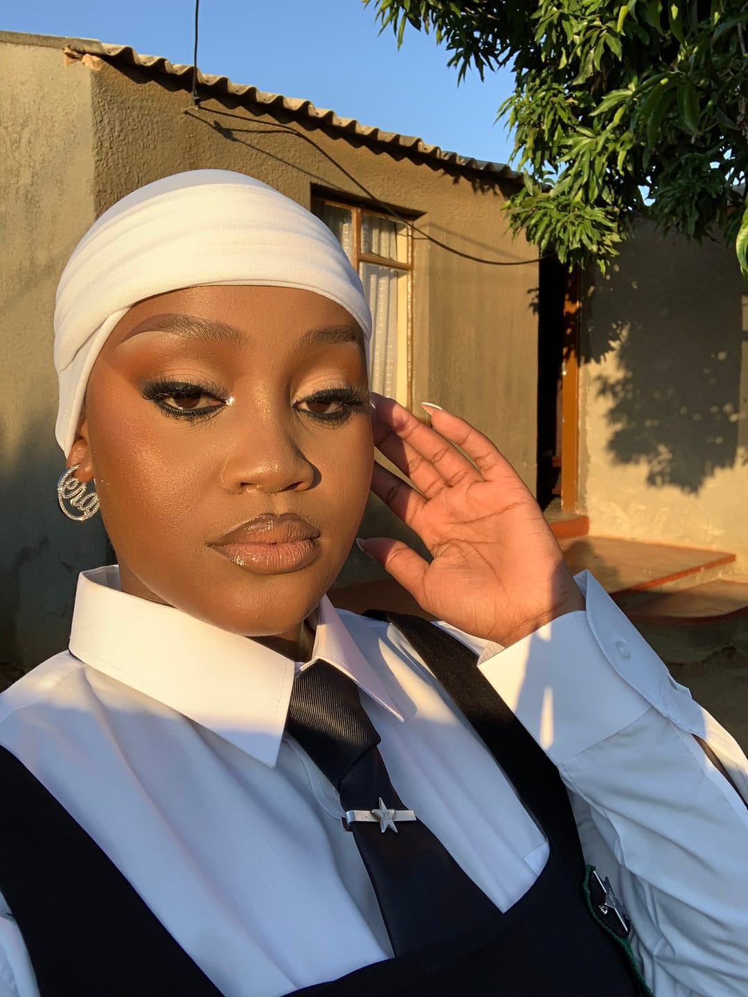 Customer photo review of Silver Luxe Mini Logo Hoops