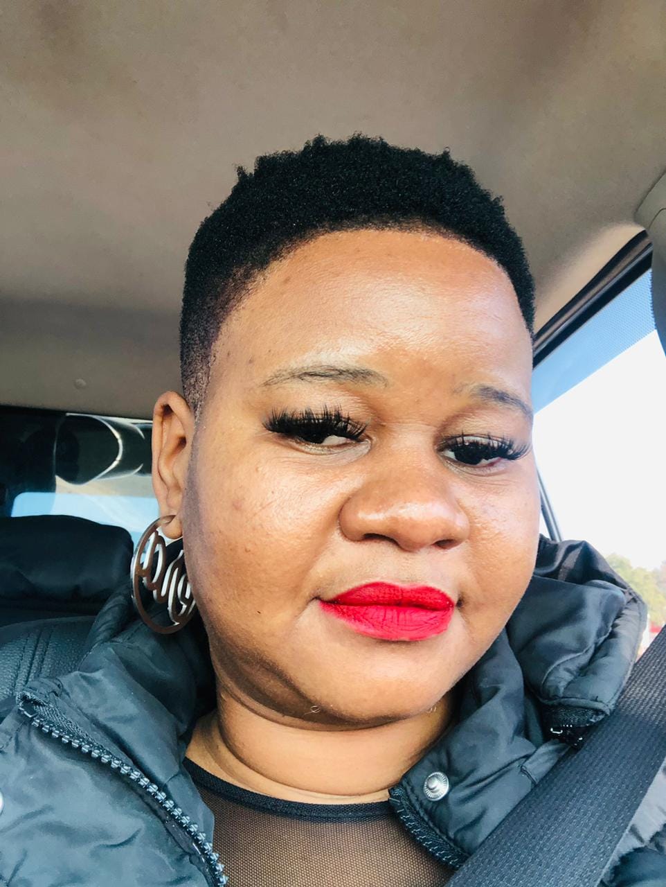 Customer photo review of Silver Luxe Logo Hoops