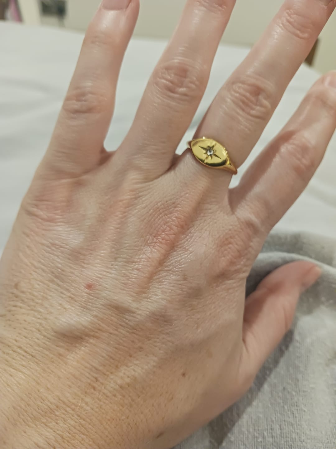 Customer photo review of Eternity North Star Ring in Gold