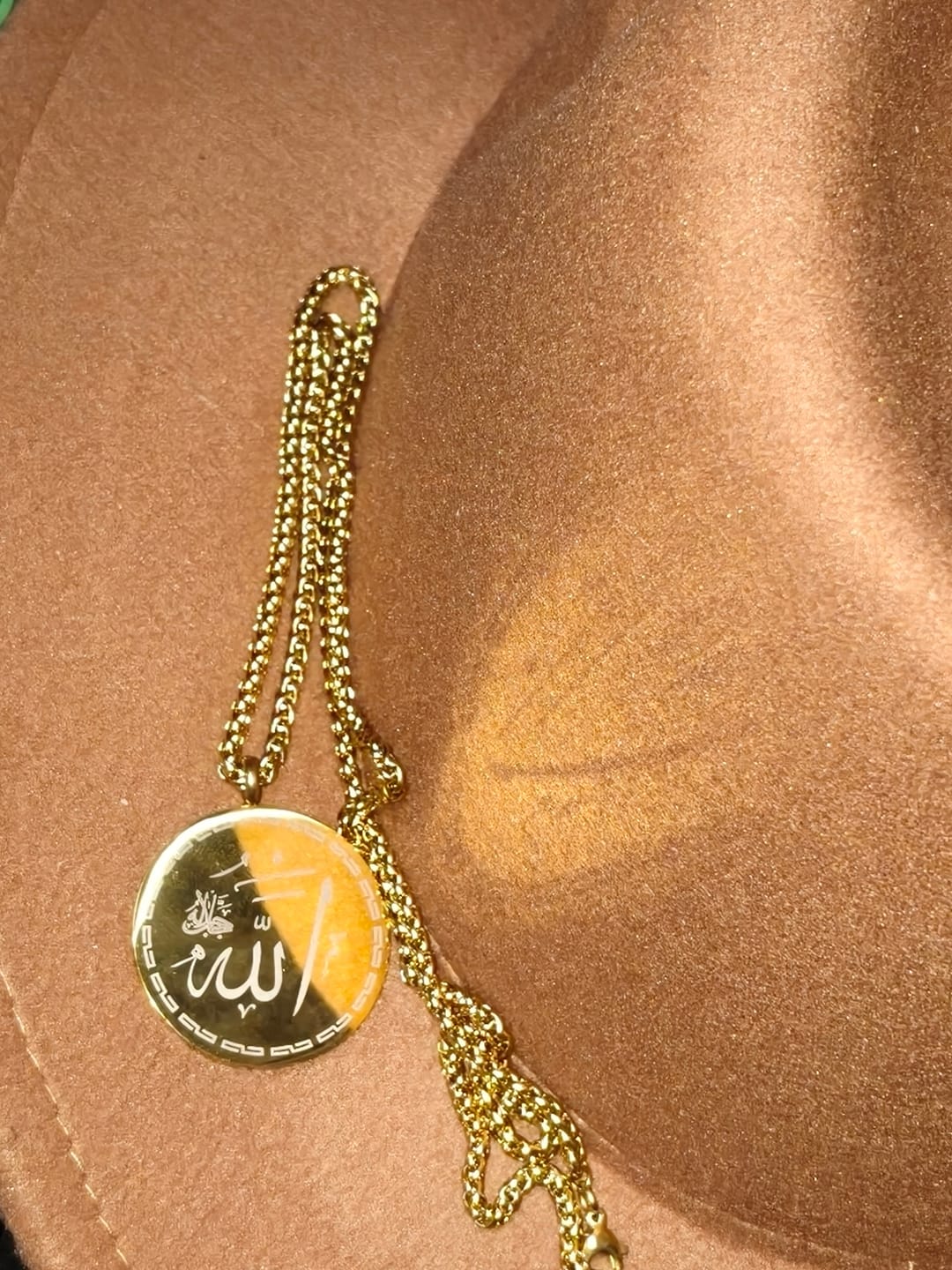 Customer photo review of HilalHaven Circle of Allah’s Majesty Engraved Pendant Necklace — Polished Stainless Steel
