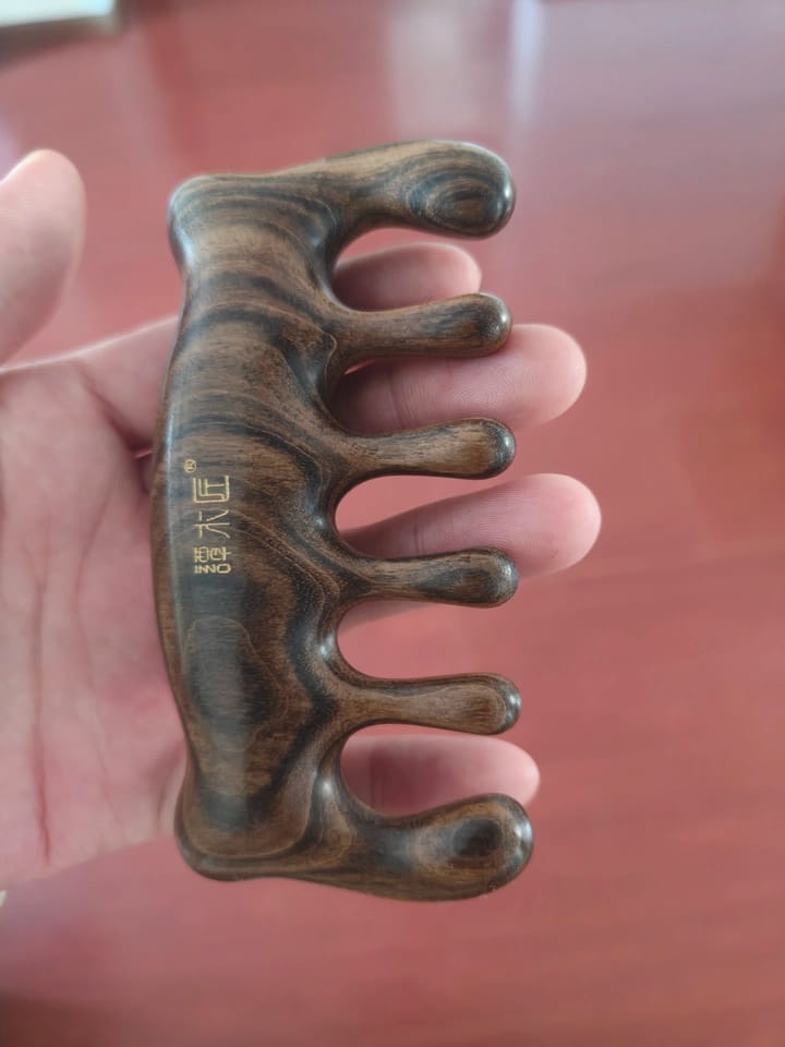 Customer photo review of Bear Scrapping Massager