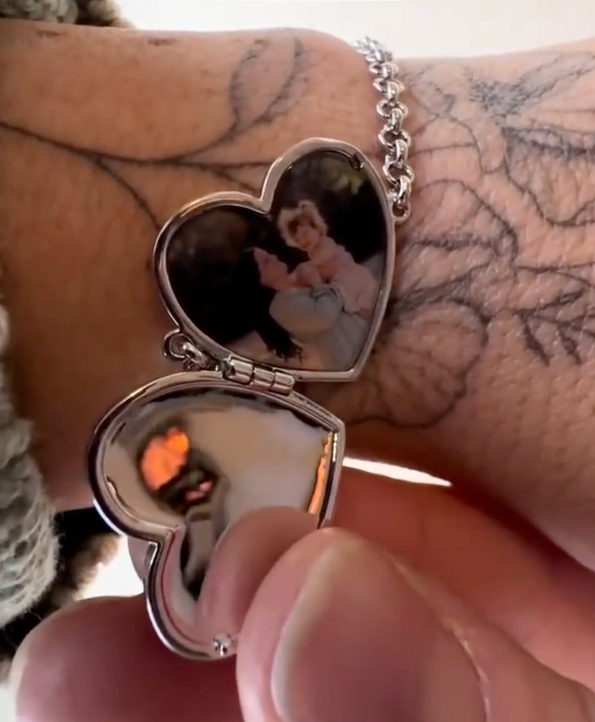 Customer photo review of Custom Photo Heart Locket Bracelet