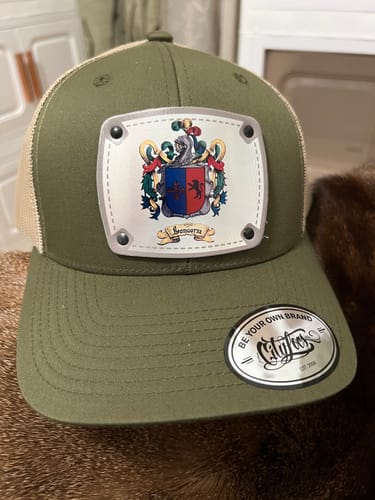 Customer's olive green Pet Image Hat with a custom family coat of arms patch on the front.