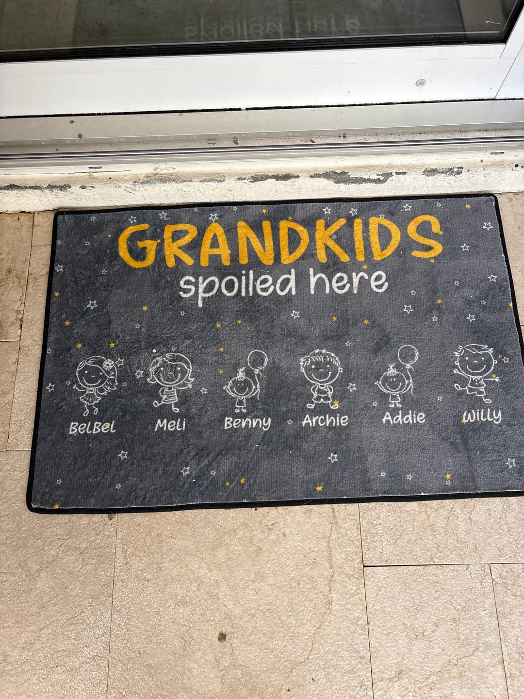 Customer photo review of Grandkids Spoiled Here Doodle - Personalized Doormat