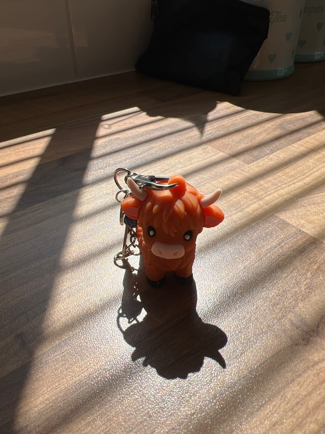 Customer photo review of 🐮A Little Highland Cow For You Keychain: Your Daily Reminder of Quiet Strength
