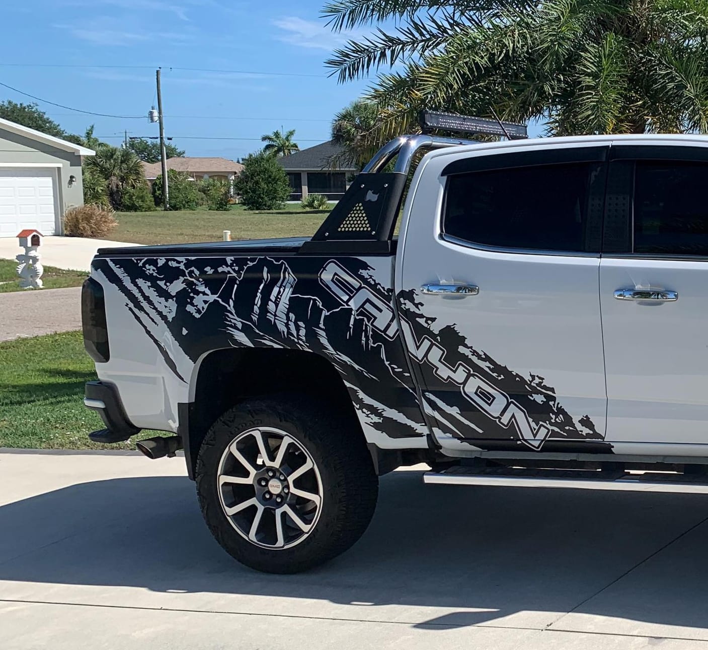 Customer photo review of GMC Canyon Truck Mud Splash Vinyl Car Graphic Sticker. Set of 2. #7050