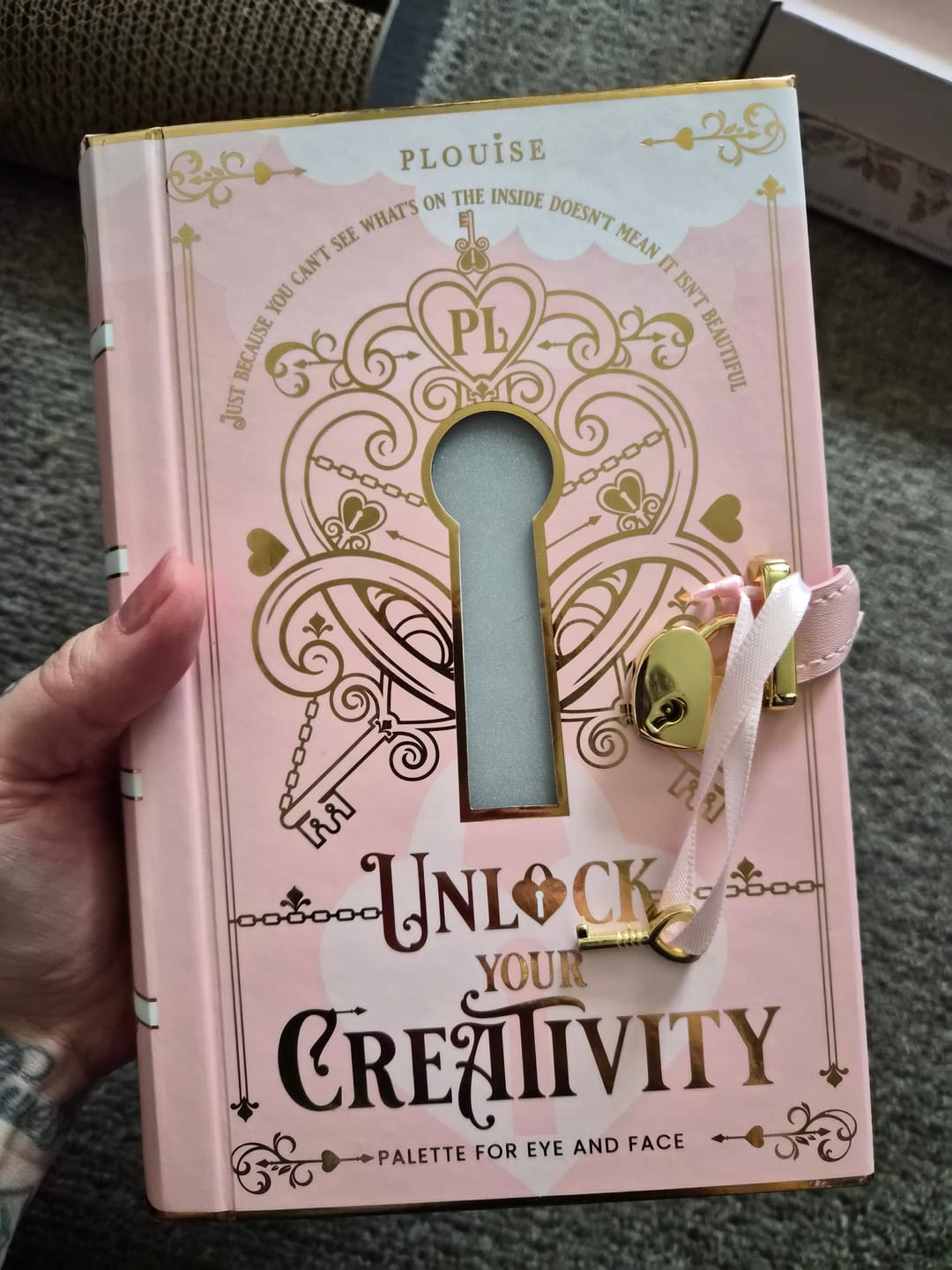 Customer photo review of Unlock Your Creativity Rainbow Eyeshadow Palette