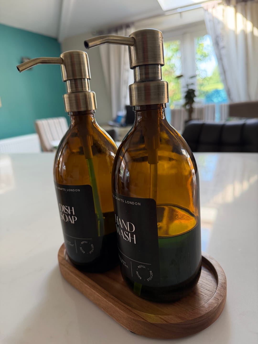 Customer photo review of Set of 2 Frosted Amber Glass Bottle 500 ML with Metal Pump & Small Tray Black Label