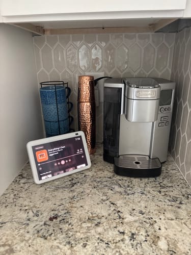 Customer's Himalayan Ayurvedic Pure Copper Bottle on a kitchen counter next to a coffeemaker.