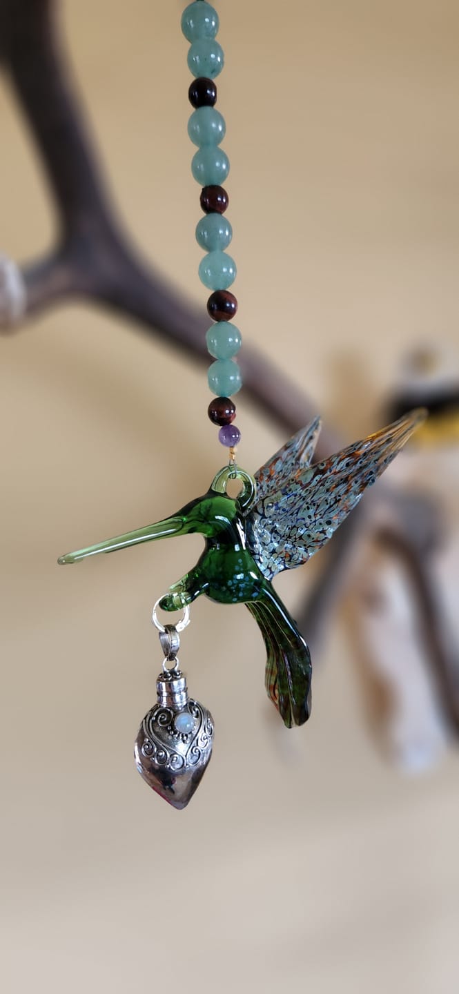 Customer photo review of Green and Tan Hummingbird with Keepsake Urn