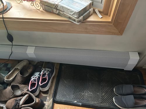 Customer photo review of Standard White Baseboard Covers by the Foot